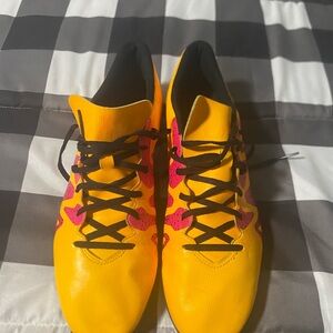 Yellow and Pink Soccer Cleats